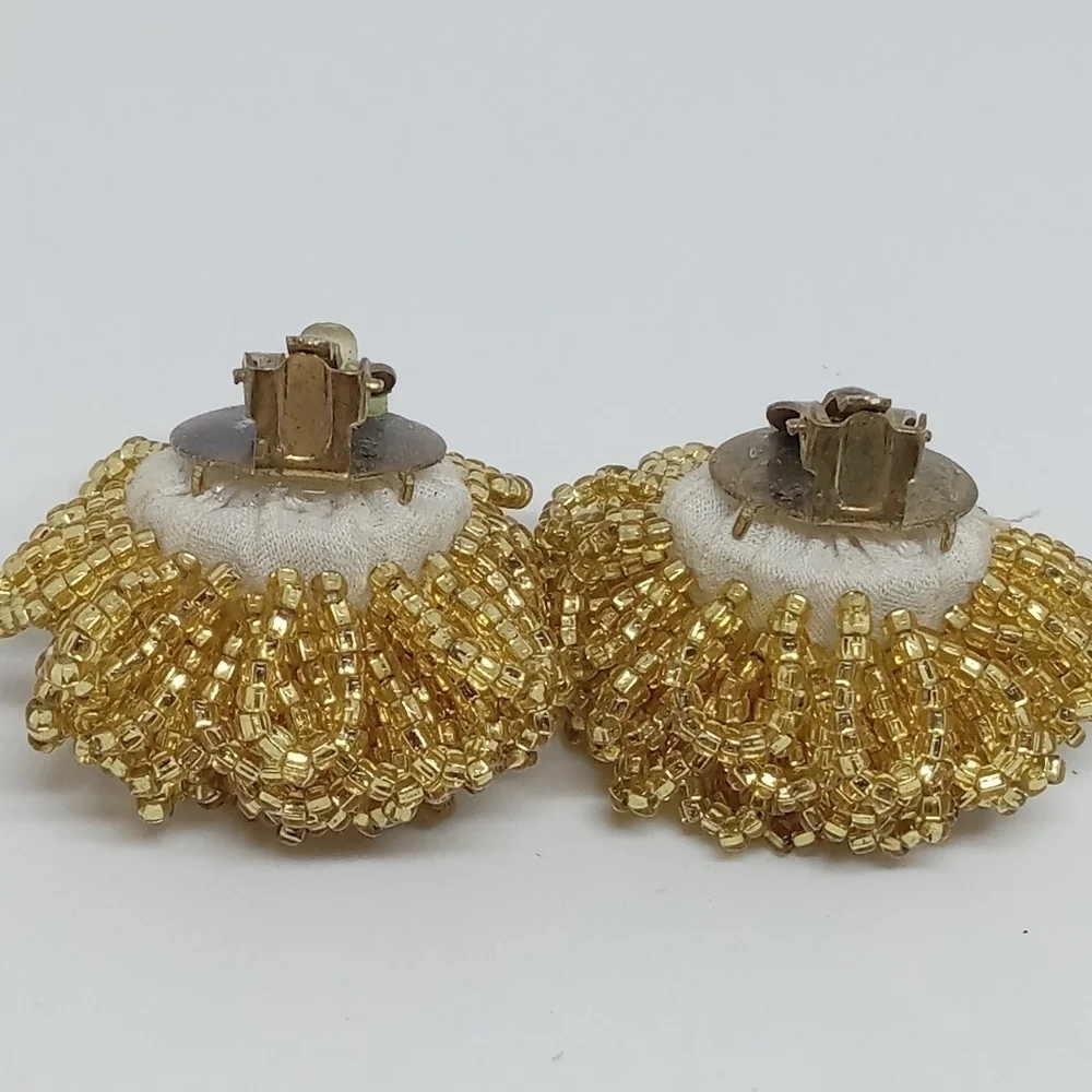 * vintage gold tone glass seed beads flower puff dramatic clip on earrings